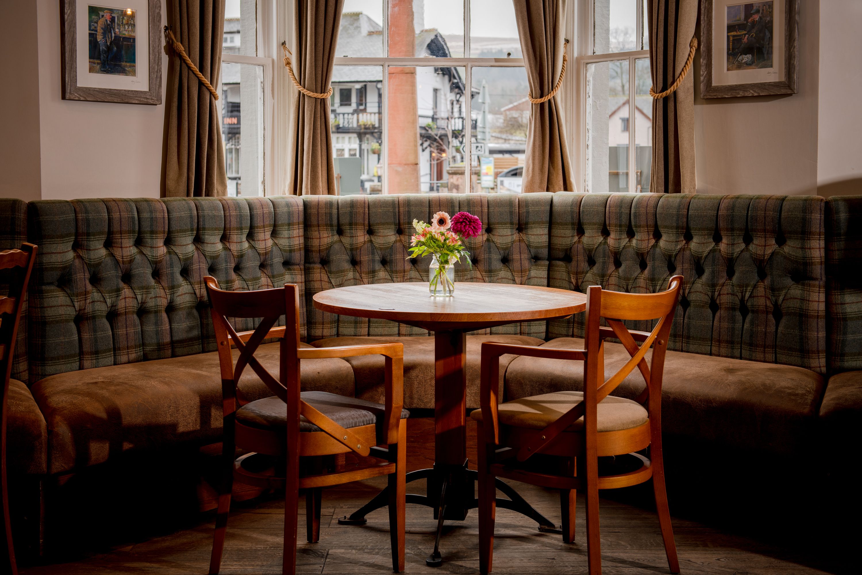 table in window overlooking village